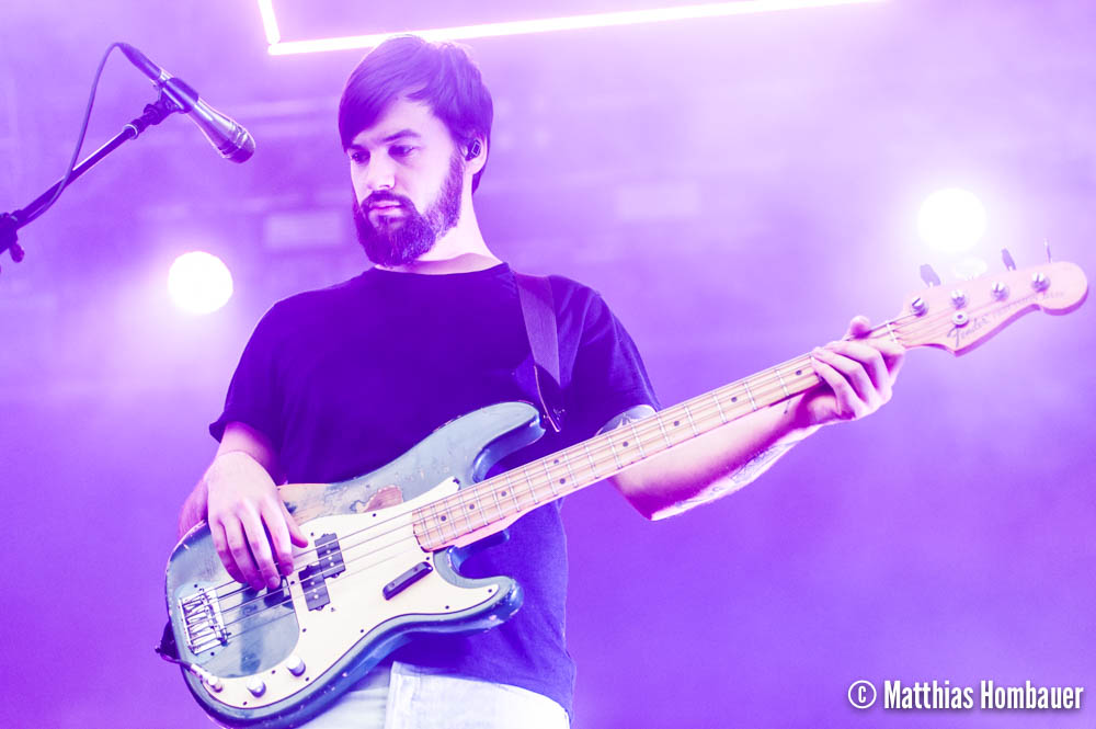 Ross MacDonald of The 1975 in concert on 1 July 2017 at the Arena Vienna