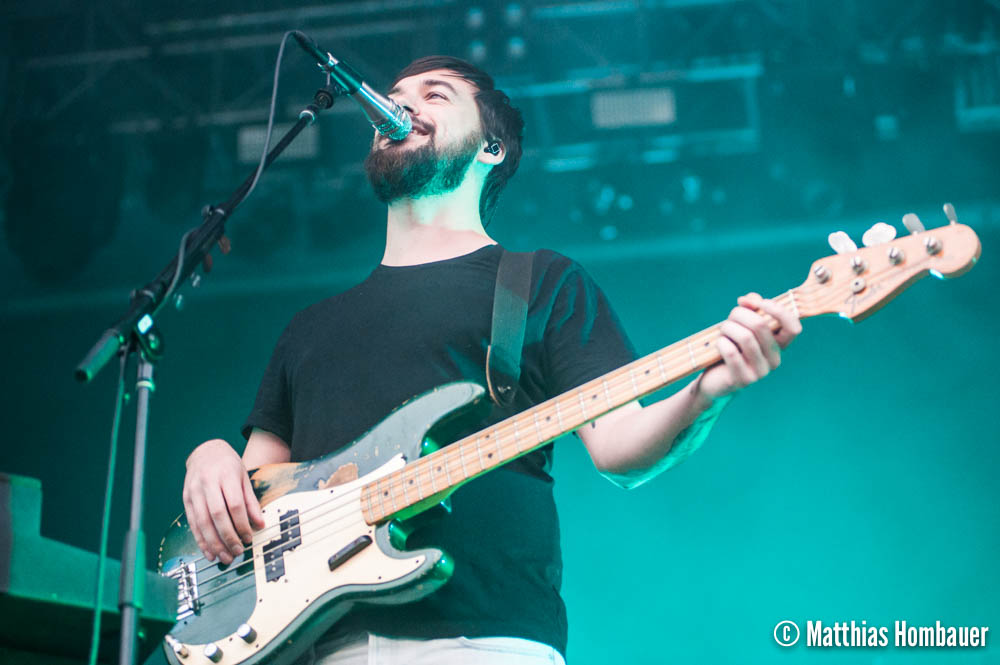 Ross MacDonald of The 1975 in concert on 1 July 2017 at the Arena Vienna